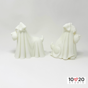 Standing and sitting Ghostly Schnauzer lanterns shown from the back